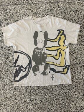 Cactus Jack KAWS Graphic Tee in Light Gray and Yellow